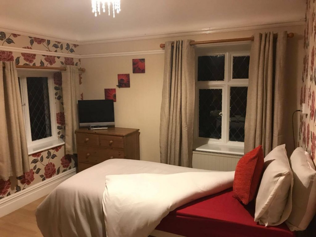 Comfortable bedroom for garthowen care home residents