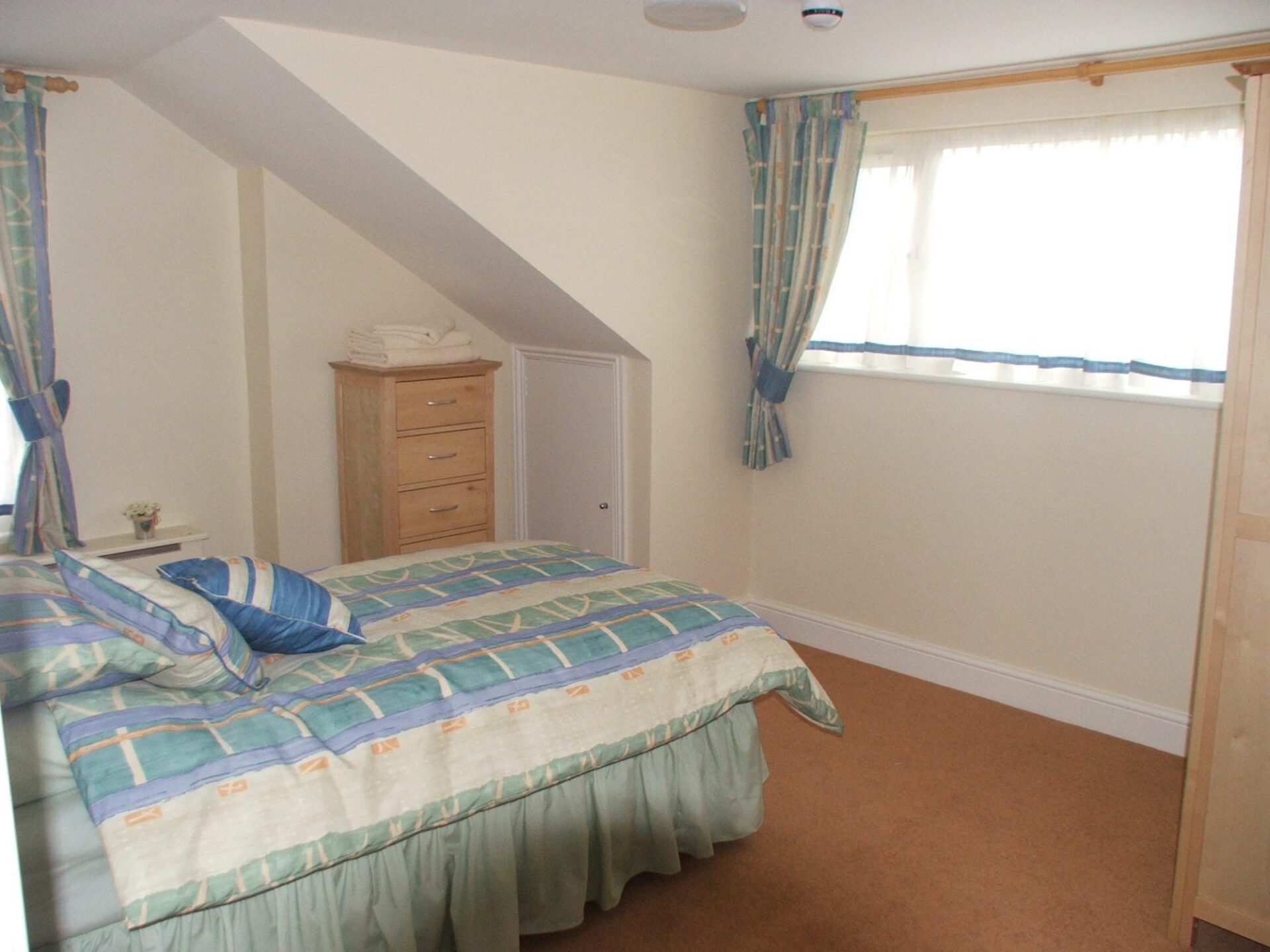 Loft bedroom at Birdhurst Rise