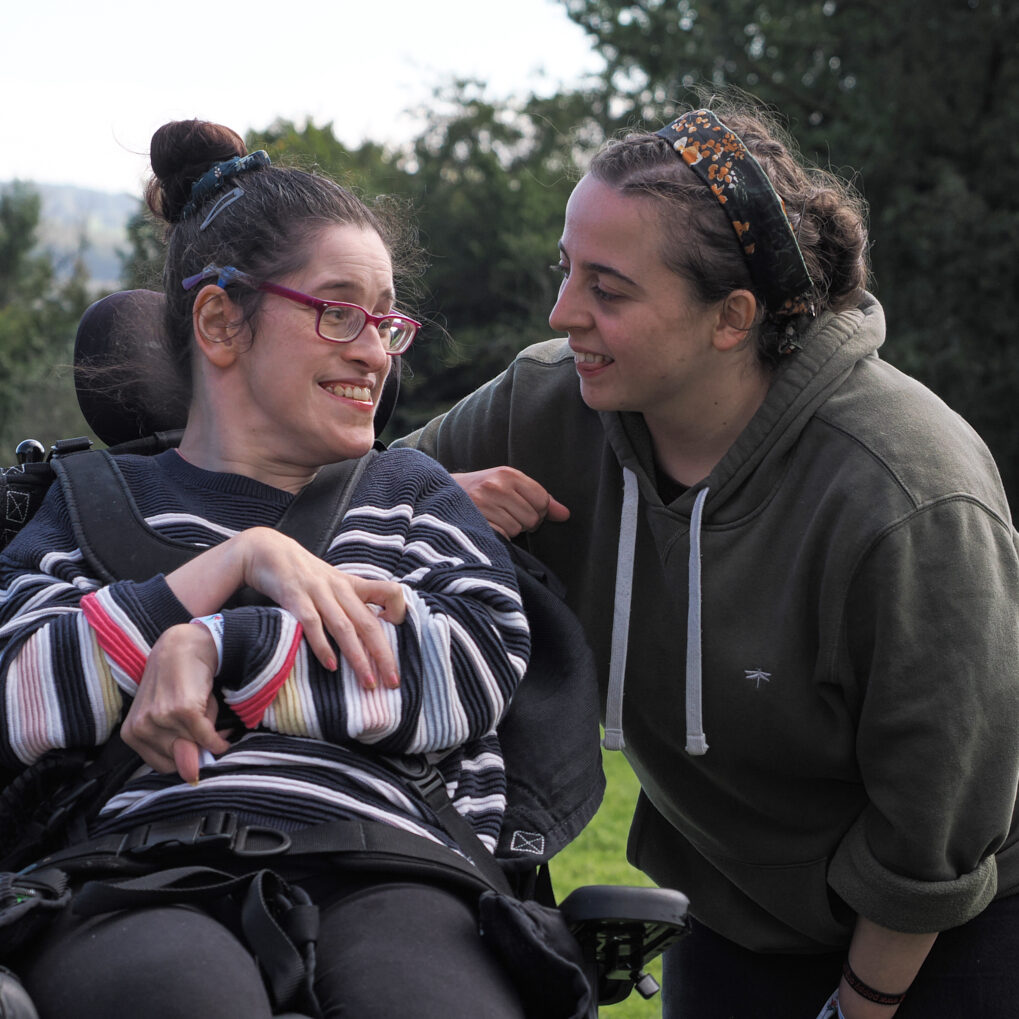 2) Support worker listening attentively