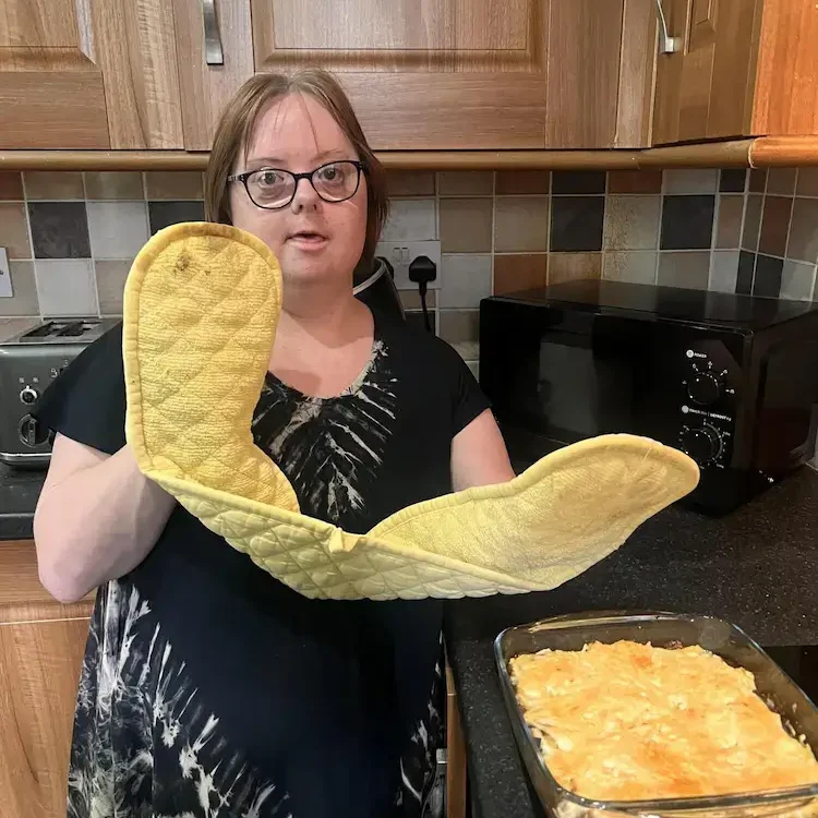 person learning to cook