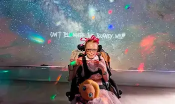 happy girl in wheelchair